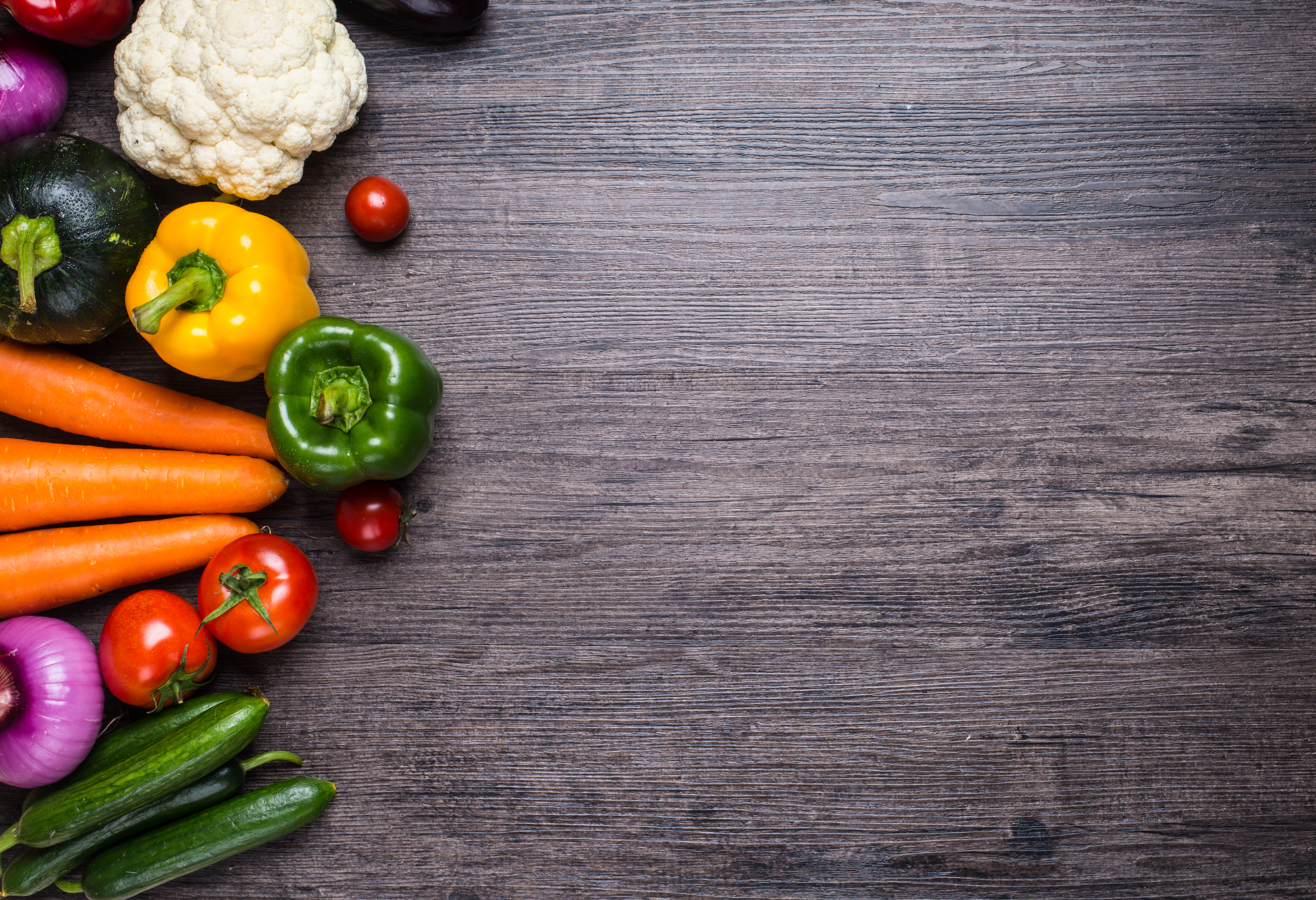 studio photography of different fruits and vegetables on old wooden table