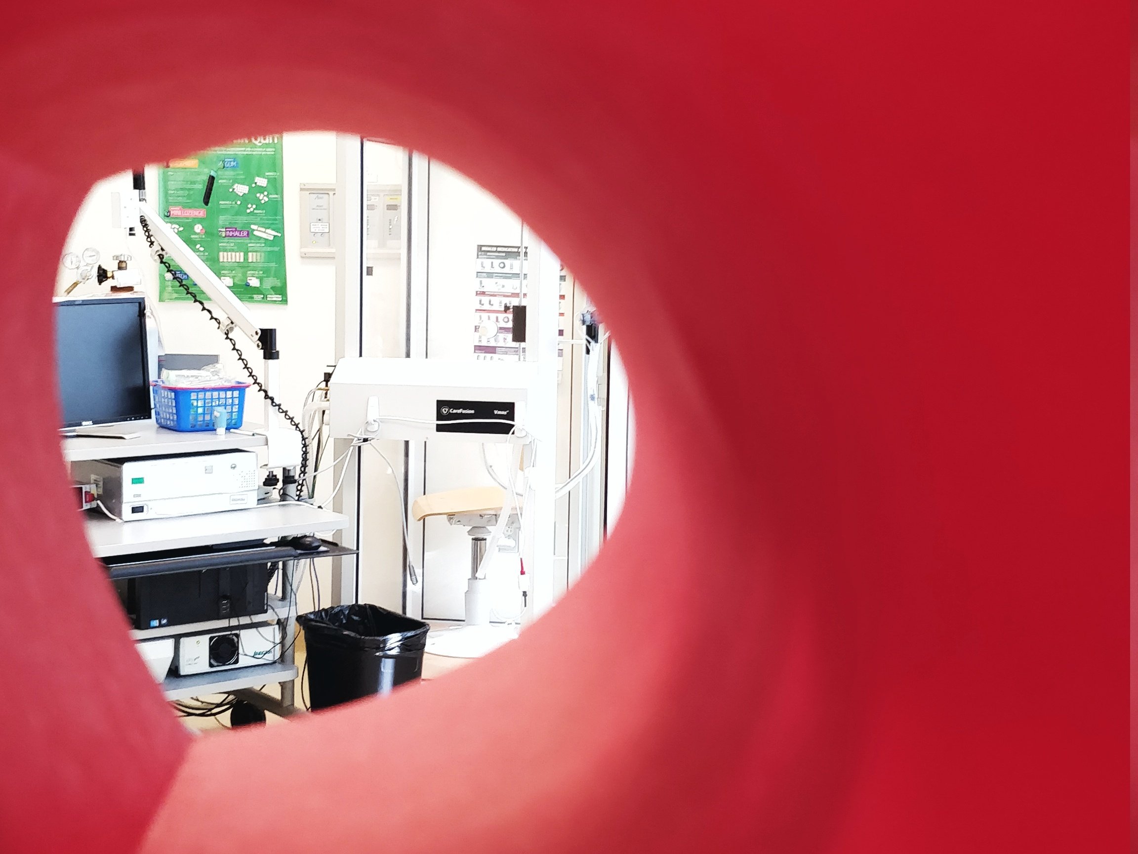 Image of the pulmonary function testing lab with circular red boarders.